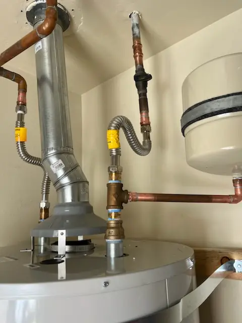 Water heater installation and plumbing repair in Pumptown